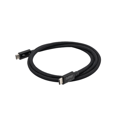 A black braided Thunderbolt 5 cable coiled, with the CalDigit brand name and 240 watts visible on one connector.
